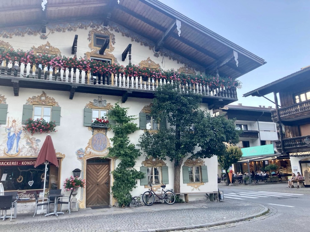 Painted Bavarian houses on a street corner in Oberaudorf
